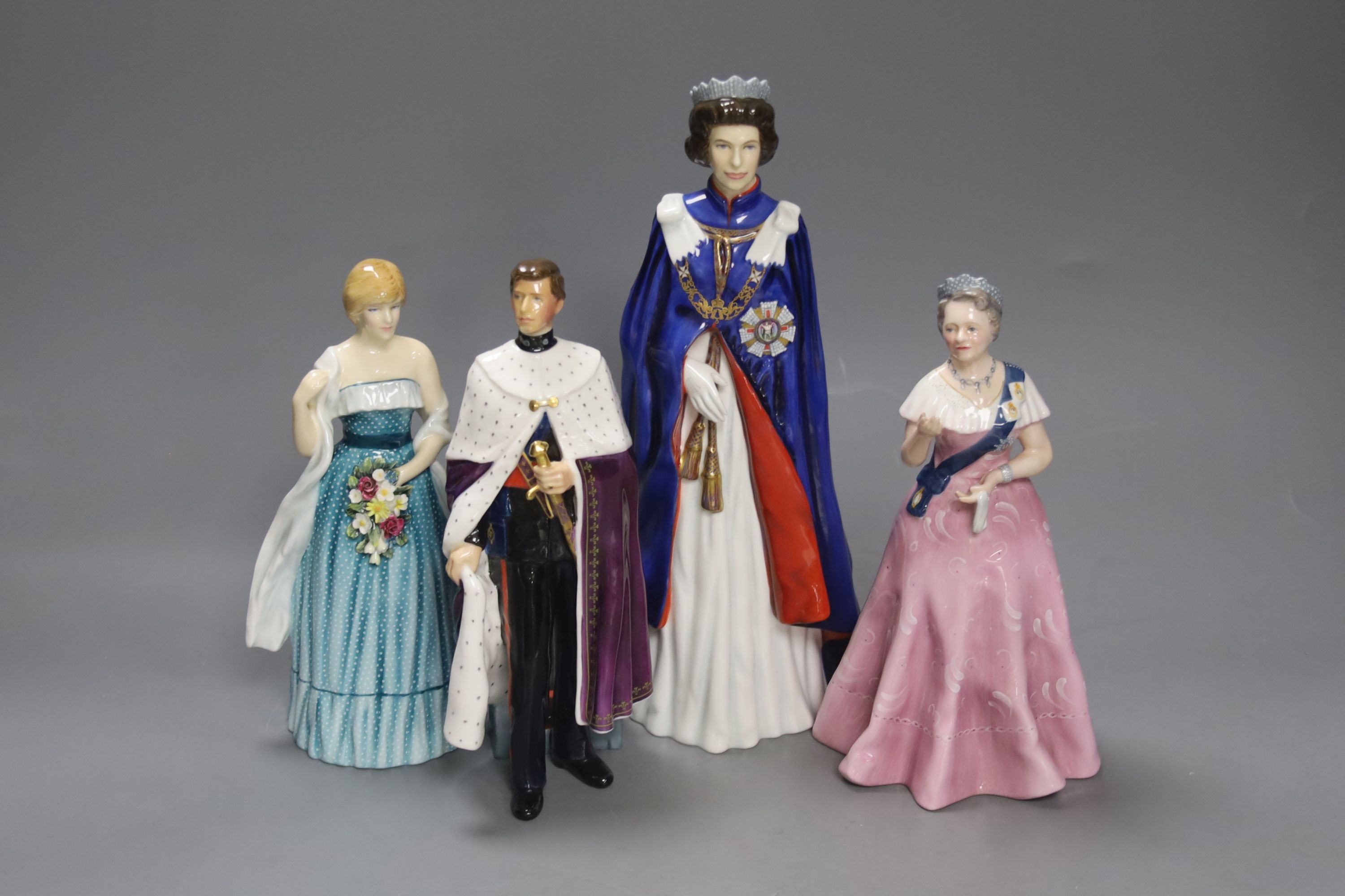 A Royal Doulton figure, 'HM Queen Elizabeth II 30th Anniversary of the Coronation', no. 129/2500 and three other Royal figures